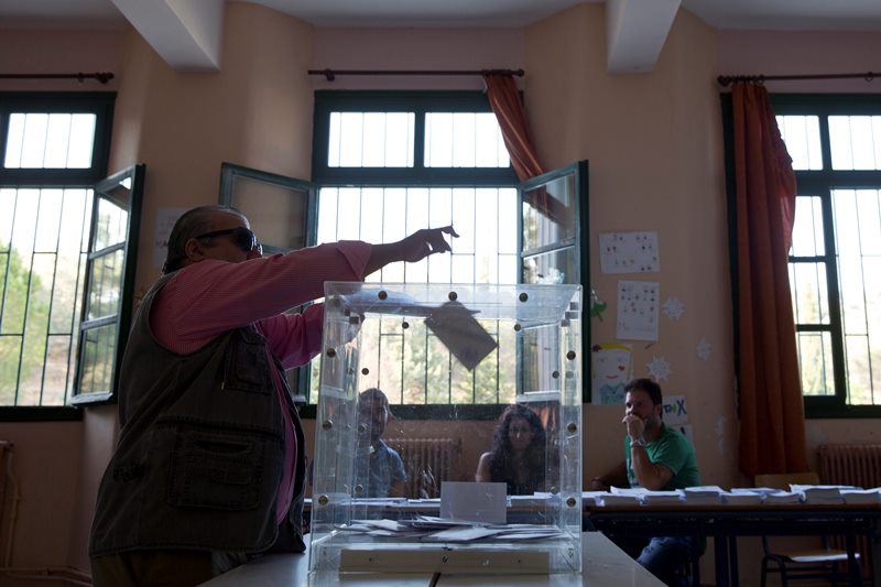 Lesbos, Greece’s third-largest island is bearing the brunt of the migrant crisis as more than 300,000 people have reached the country clandestinely so far this year. Greeks were voting Sunday in their third national poll this year, called on to choose who they trust to steer the country into its new international bailout.