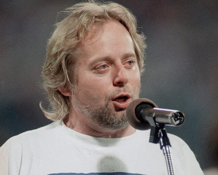 Actor Michael Burgess sings the Canadian national anthem, Saturday, Oct. 17, 1992 in Atlanta before the start of game one of the 1992 World Series between the Toronto Blue Jays and the Atlanta Braves. His powerful voice enthralled theatre and sports fans alike, and on Tuesday, stars from both worlds offered a chorus of tributes to tenor Michael Burgess.The musical theatre star - who spellbound audiences as Jean Valjean in "Les Miserables" and became well-known to hockey fans for his stirring renditions of "O Canada" -died Monday after a lengthy battle with cancer.