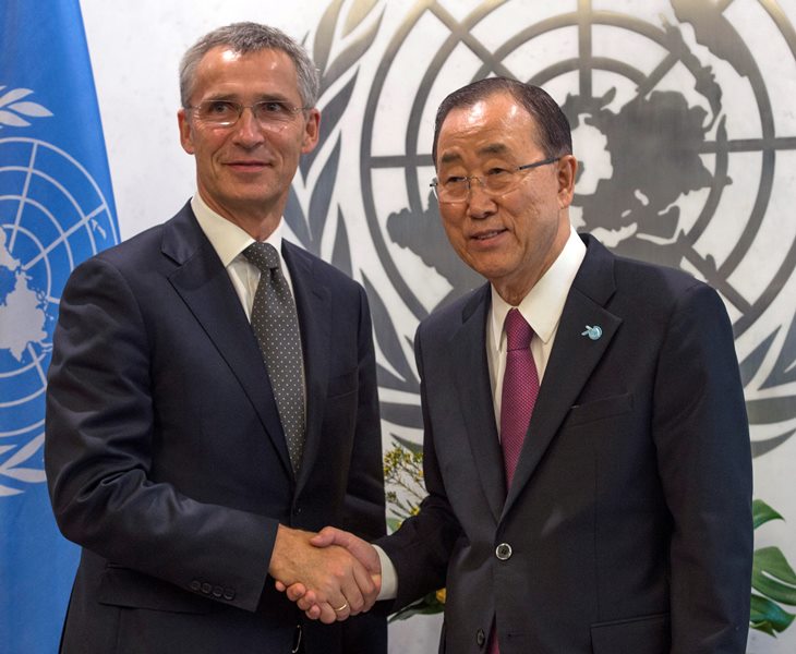 In a Saturday, Sept. 26, 2015 file photo, NATO Secretary-General Jens Stoltenberg left, meets United Nations Secretary-General Ban Ki-moon, right, at United Nations headquarters. Stoltenberg, in New York to attend the annual U.N. General Assembly, told The Associated Press on Tuesday, Sept. 29, 2015 that the alliance welcomes Russia's plans to combat the Islamic State group in Syria. 