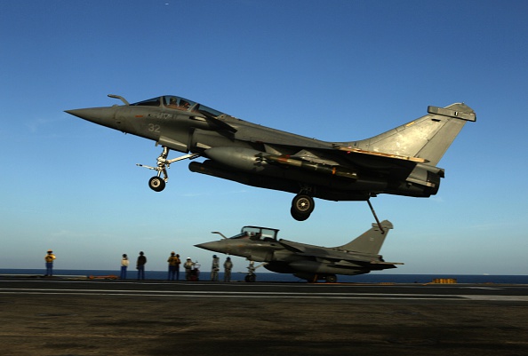 A Rafale fighter jet lands on the French Navy aircraft carrier Charles de Gaulle operating in the Gulf on February 24, 2015.  