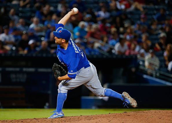 Marco Estrada #25 of the Toronto Blue Jays pitches in the eighth inning against the Atlanta Braves at Turner Field on September 17, 2015 in Atlanta, Georgia.  (Photo by Kevin C. Cox/Getty Images).