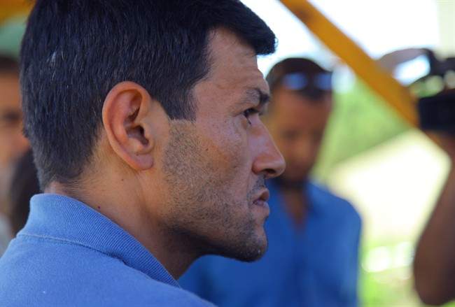 Abdullah Kurdi, 40, father of Syrian boys Aylan, 3, and Galip, 5, who were washed up drowned on a beach near Turkish resort of Bodrum on Wednesday, waits for the delivery of their bodies outside a morgue in Mugla, Turkey, Thursday, Sept. 3, 2015.
