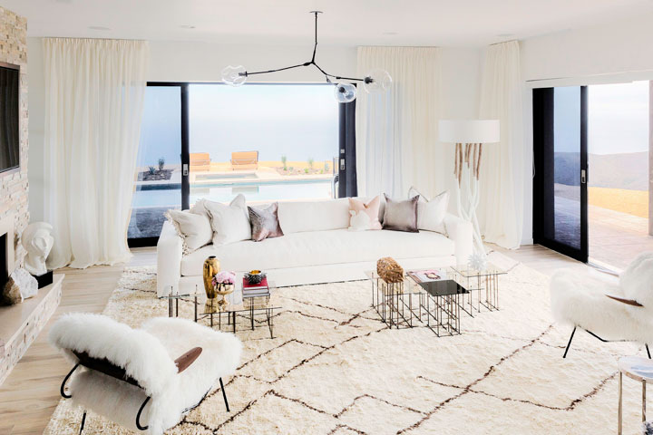 This Aug. 2015 photo provided by courtesy of Lori Margolis Interiors and Architectural Digest shows, Caitlyn Jenner's living room in Malibu, Calif.