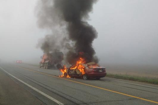 A car caught fire and was engulfed in flames following a collision with a potato truck on Route 130 in Wicklow, N.B.
