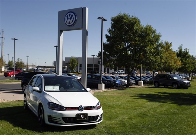 Volkswagens are on display on the lot of a VW dealership.