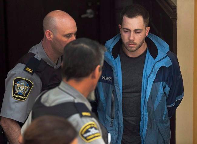 Christopher Calvin Garnier, charged with second-degree murder in the death of Constable Catherine Campbell , an off-duty police officer, arrives at provincial court in Halifax on Sept. 17, 2015. THE CANADIAN PRESS/Andrew Vaughan.