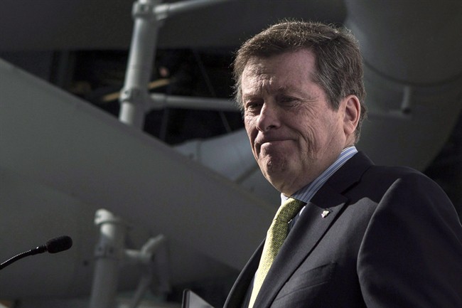 Toronto Mayor John Tory attends an announcement in Toronto on February 6, 2015. Days before Toronto must decide whether to bid for the 2024 Summer Olympics, critics are sounding the alarm over what they call unprecedented secrecy surrounding the process. Opponents of a possible bid say Mayor John Tory is keeping the details and costs of a potential Toronto proposal under wraps, while at least one member of the mayor's own council has accused him of conducting backroom deals.