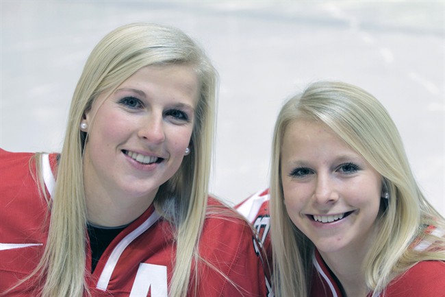 Bailey Bram, left, and sister Shelby from St. Anne, Man., are shown in an undated handout photo. 