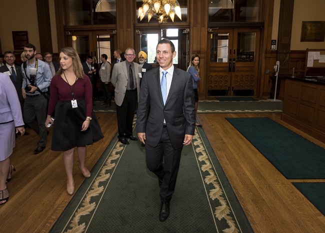 Progressive Conservative Leader Patrick Brown walks through the foyer of Queen's Park following his swearing-in ceremony as a member of the Ontario legislature in Toronto on Monday, September 14, 2015.