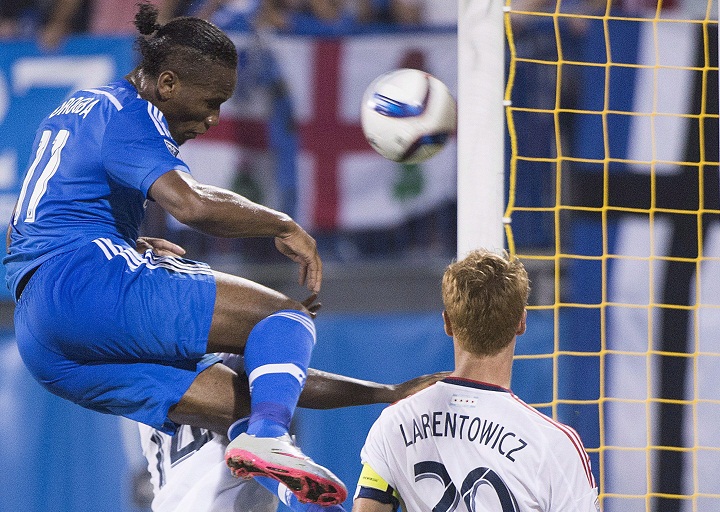 Montreal Impact's Didier Drogba (11) scores against the Chicago Fire during second half MLS soccer action in Montreal, Saturday, September 5, 2015.