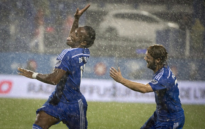 Montreal Impact's Didier Drogba celebrates his goal against New England Revolution during seconnd half MLS action in Montreal on Saturday, September 19, 2015. 