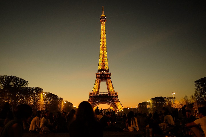 The Eiffel Tower is seen at sunset in Paris, France, Sunday, April 12, 2015.