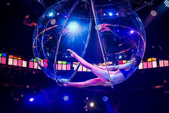 Miss A performs in a bubble during Spiegelworld's 'Empire' show. 