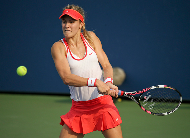 Canada’s Eugenie Bouchard returns a shot against Alison Riske, of the United States, during the first round of the U.S. Open tennis tournament, Monday, Aug. 31, 2015, in New York. 