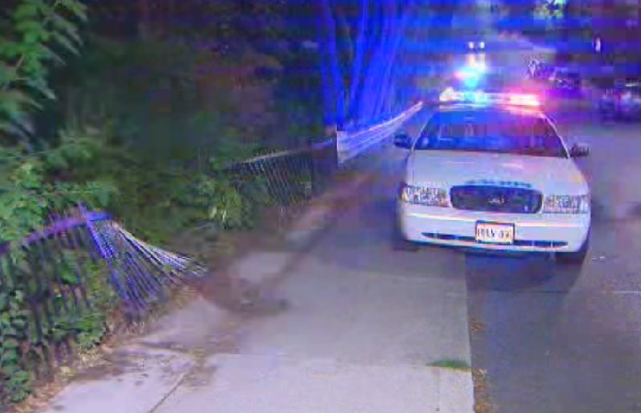 Driver sought after car crashes through fence near Bloor West - image