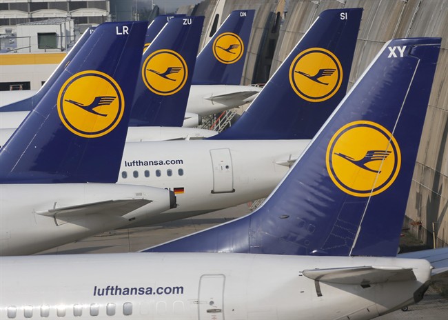 FILE - In this April 2, 2014 file picture Lufthansa aircrafts are parked as Lufthansa pilots went on a three-days-strike in Frankfurt, Germany. The German pilots' association announced a one-day strike starting Tuesday, Sept. 8, 2015. (AP Photo/Michael Probst,file).
