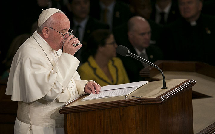 Pope Francis drinks a glass of water while addresses a Joint Meeting of Congress in the Capitol in Washington, Thursday, September 24, 2015.