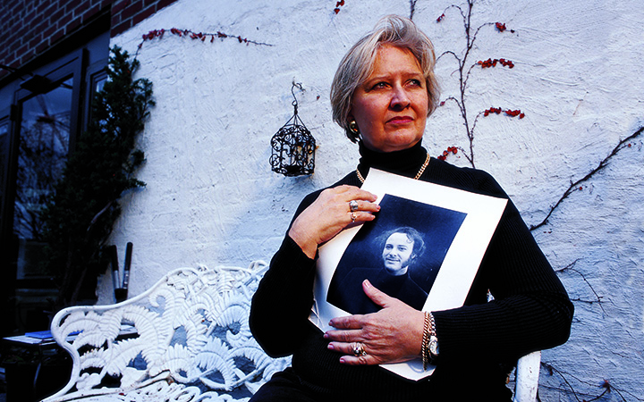 Joyce Horman holding a photo of her freelance journalist husband Charles Horman. Horman was executed in Chile's National Stadium in sept. 1973 during a coup by Gen. Augusto Pinochet. 