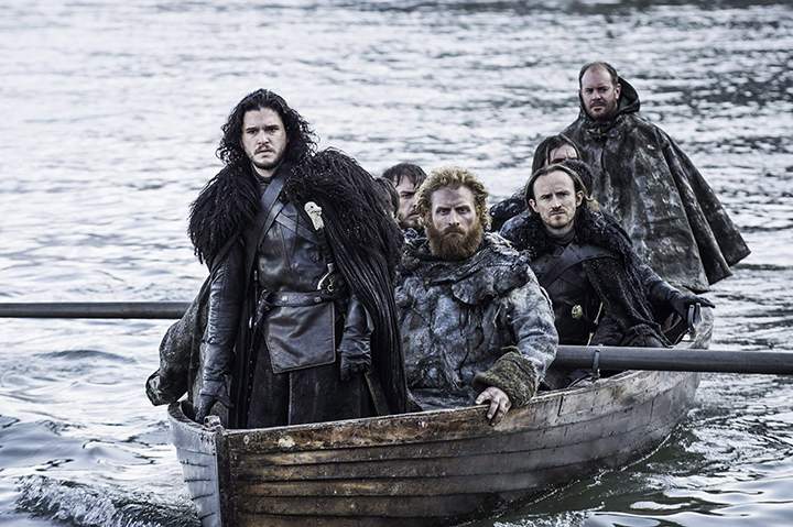 This image released by HBO shows Kit Harington as Jon Snow, left, in a scene from "Game of Thrones." There are a mountain of "Game of Thrones" Emmy nominations this year, and among them, a cadre of Canadian contenders. 