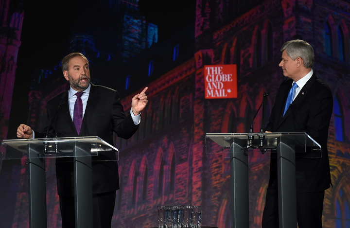 NDP leader Tom Mulcair, left, makes a point to Conservative leader Stephen Harper at the Globe and Mail hosted  leaders' debate Thursday, September 17, 2015  in Calgary.THE CANADIAN PRESS/Sean Kilpatrick.