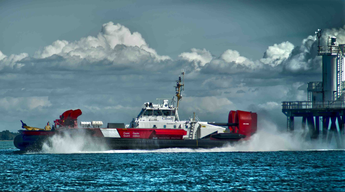 File photo. The Canadian Coast Guard hovercraft, pictured here passing the Sand Head Lighthouse, was one of several vessels tasked to help with a sinking sailboat in the waters off of Richmond.