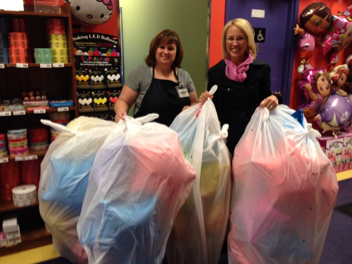 Continuing the celebration, Global drops off 40 balloons to Children’s