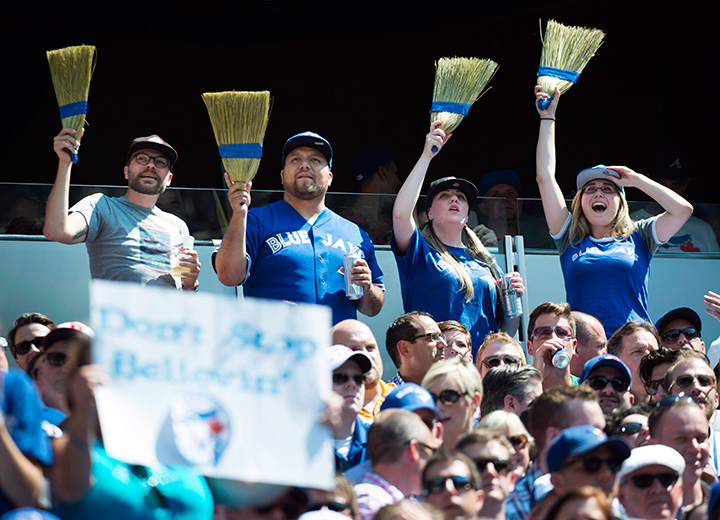 Fans celebrate the Toronto Blue Jays' series sweep of the Oakland Athletics during MLB baseball action in Toronto on Thursday, August 13, 2015. 