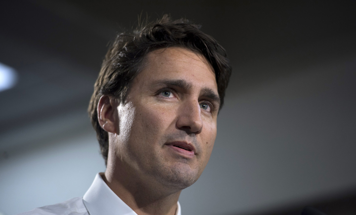 Liberal leader Justin Trudeau speaks to the media prior to a rally in Edmonton on Wednesday, Sept, 9, 2015.   THE CANADIAN PRESS/Jonathan Hayward.