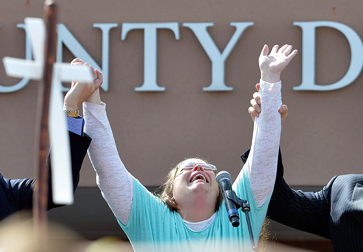 Rowan County Clerk Kim Davis cries out after being released from the Carter County Detention Center, Tuesday, Sept. 8, 2015, in Grayson, Ky. 