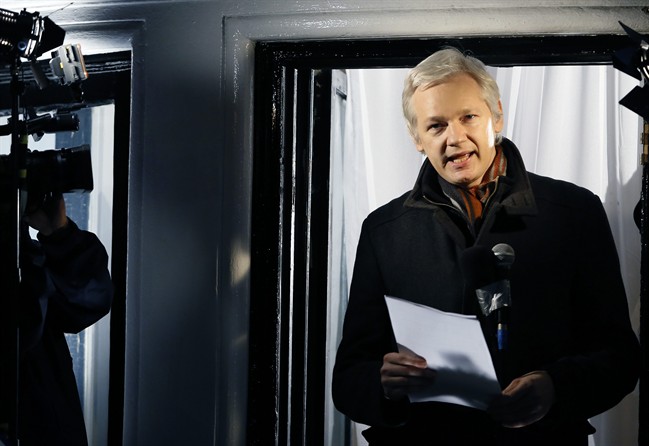 In this Thursday, Dec. 20, 2012 file photo, Julian Assange, founder of WikiLeaks, speaks to the media and members of the public from a balcony at the Ecuadorian Embassy in London. 