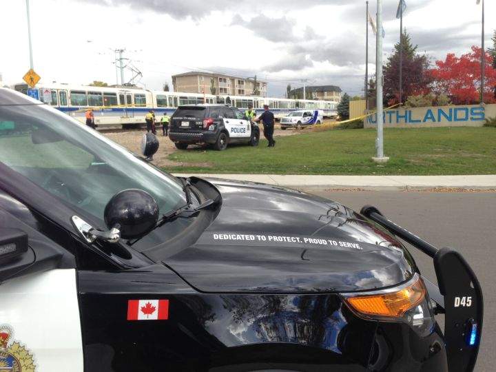 Police investigate a collision between a cyclist and LRT train Saturday, Sept. 26, 2015.