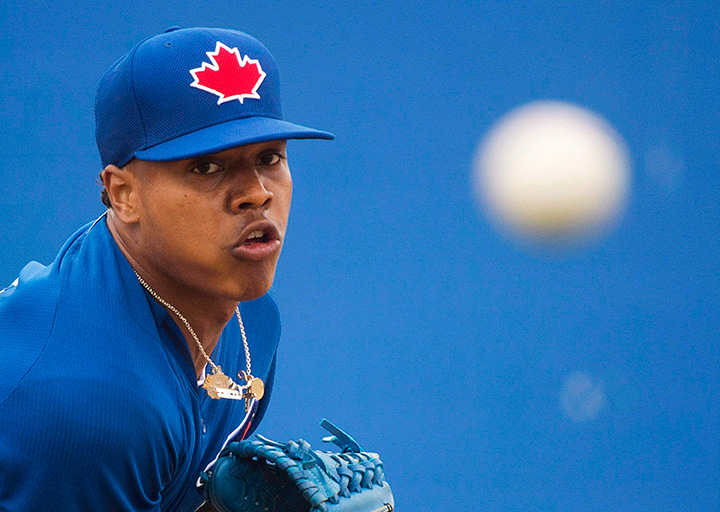 Toronto Blue Jays starting pitcher Marcus Stroman pitches a bullpen session during baseball spring training in Dunedin, Fla., on Thursday, February 26, 2015. 