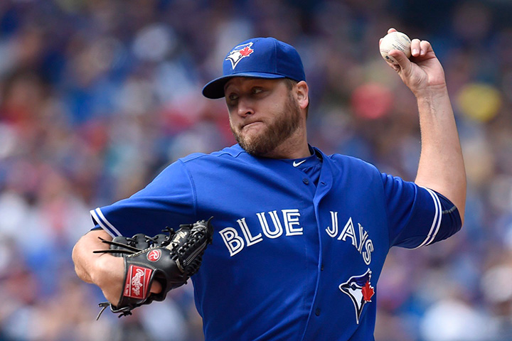 Toronto Blue Jays' starting pitcher Mark Buehrle throws against the Tampa Bay Rays during American League action in Toronto on Sunday, Sept. 27, 2015. 
