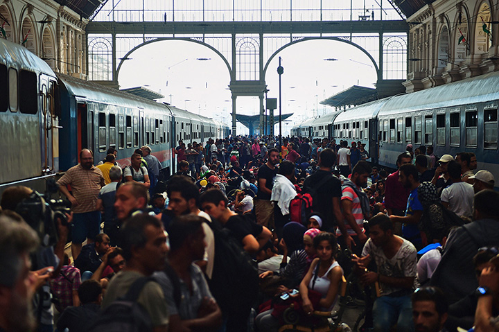 Migrants and refugees crowd the platforms at the Keleti (eastern) railway station in Budapest on September 1, 2015.  