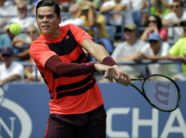 Milos Raonic, of Canada, returns a shot against Fernando Verdasco, of Spain, during the second round of the U.S. Open tennis tournament, Wednesday, Sept. 2, 2015, in New York.