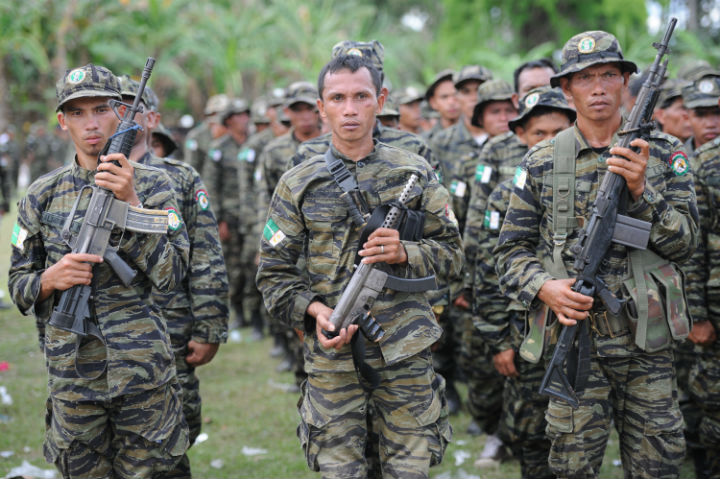 This photo taken on March 27, 2014 shows Moro Islamic Liberation Front (MILF) rebels attending a rally in support of the peace agreement with the government inside Camp Darapanan in Sultan Kudarat town, on southern island of Mindanao.