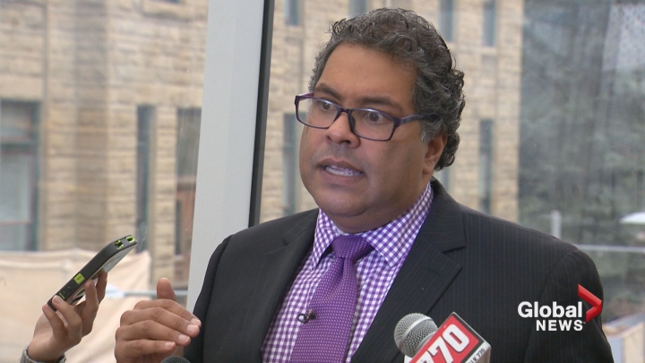 Mayor Naheed Nenshi blasts the federal government's handling of the Syrian refugee crisis while speaking to reporters at City Hall on Friday.