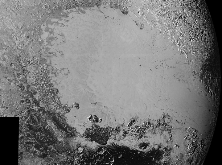 A mosaic of high-resolution images of Pluto, sent back from NASA’s New Horizons spacecraft from Sept. 5 to 7, 2015. The image is dominated by the informally-named icy plain Sputnik Planum, the smooth, bright region across the centre.