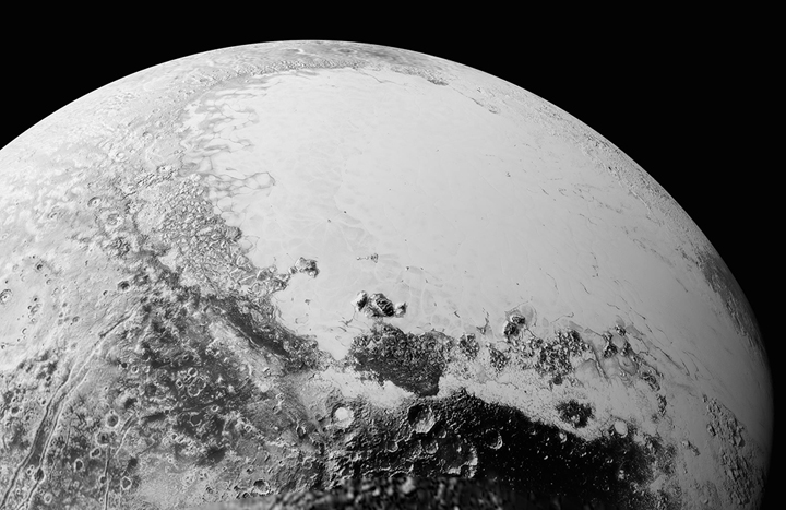 This image shows what you would see if you were approximately 1,800 kilometers above Pluto’s equatorial area, looking northeast over the dark, cratered, informally named Cthulhu Regio toward the bright, smooth, expanse of icy plains informally called Sputnik Planum. 