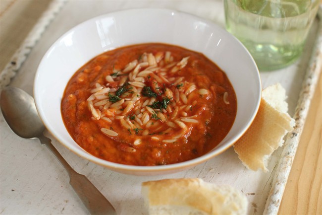 This Sept. 14, 2015 photo shows tomato, orzo and dill soup in Concord, N.H. 