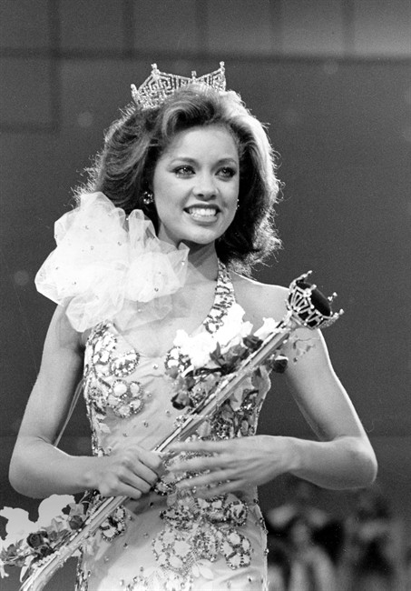 In this Sept. 17, 1983 file photo, Miss New York Vanessa Williams appears during her coronation walk after she was crowned Miss America 1984 at the Miss America Pageant in Atlantic City, N.J.