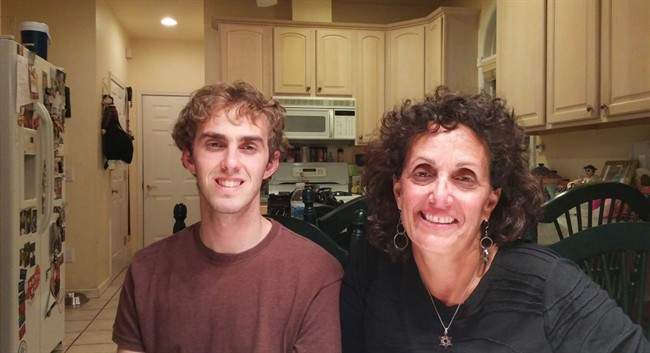 This Friday, Sept. 18, 2015 photo shows Terri Gifford, right, 56, and her son Brian Gifford, 23, at her and her husband Peter Gifford's home in New Rochelle, N.Y. Brian Gifford has lived at home with his parents for the past two years, since graduating college.