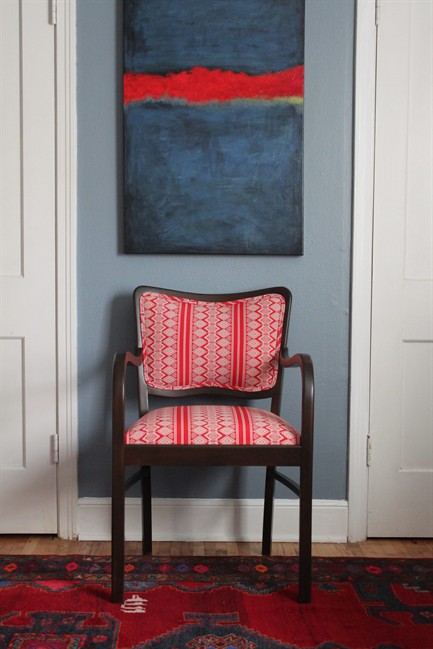 In this photo provided by Amanda Brown, Brown updated this chair for a tutorial, &quot;Upholstery Basics: Picture Perfect Backs,&quot; for the design blog Design*Sponge. Reupholstering furniture can be done with a few simple tools, patience and time, according to Brown, author of &quot;Spruce: A Step-by-step Guide to Upholstery and Design.&quot;.