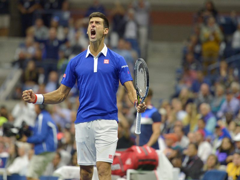 Novak Djokovic of Serbia reacts as he plays Roger Federer of Switzerland during the men's final on the fourteenth day of the 2015 US Open Tennis Championship at the USTA National Tennis Center in Flushing Meadows, New York, USA, 13 September 2015. The US Open runs through 13 September, which is a return to a 14-day schedule. 
