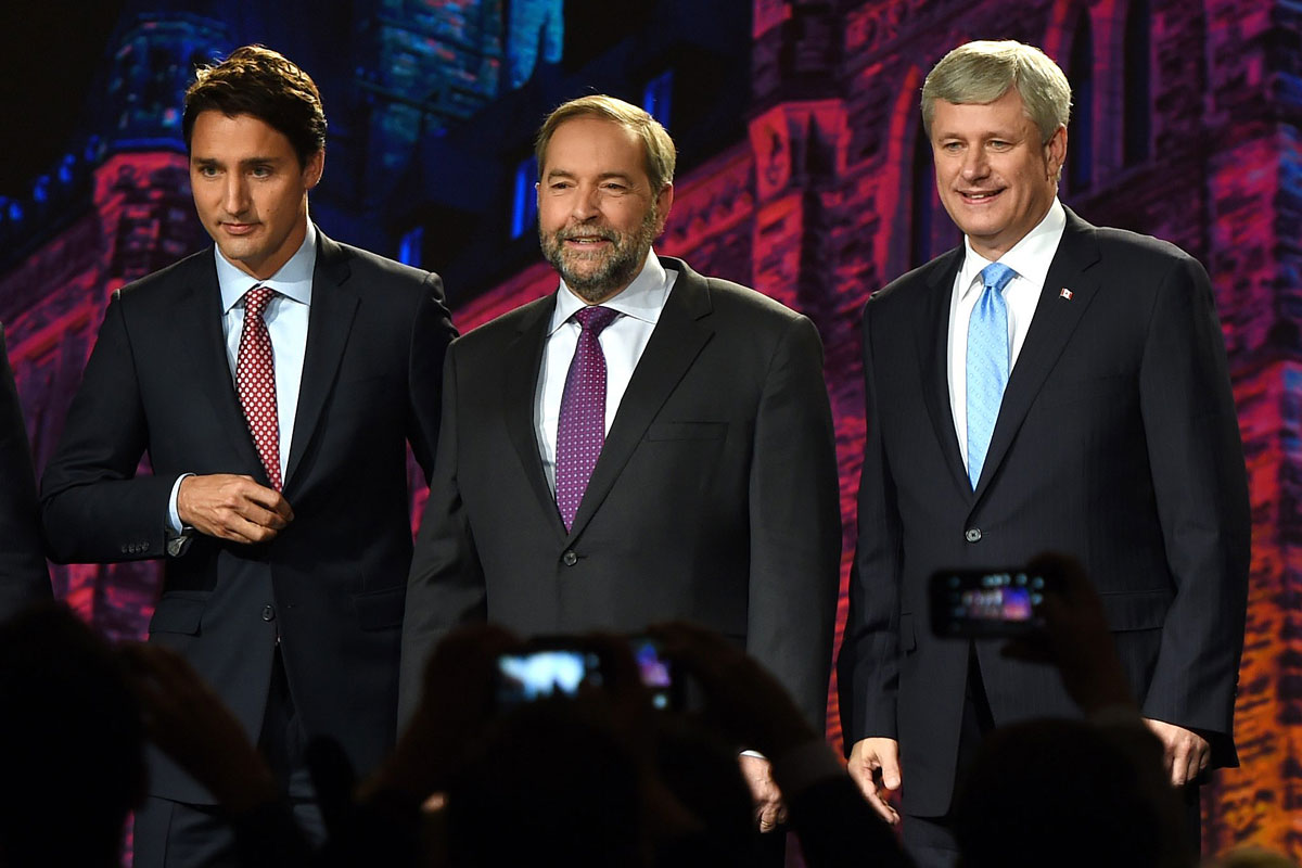 From left to right, Liberal Leader Justin Trudeau, NDP Leader Tom Mulcair and Conservative Leader Stephen Harper are introduced prior to the Globe and Mail leaders' debate in Calgary on Thursday, September 17, 2015.