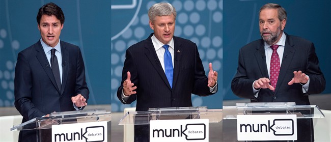 In this composite image, Liberal Leader Justin Trudeau, left to right, Conservative Leader Stephen Harper and NDP Leader Thomas Mulcair take part in the Munk Debate on foreign affairs, in Toronto, on Monday, Sept. 28, 2015. 