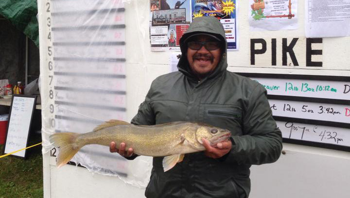 Saskatchewan man lands two whopping walleye over two days to win two major prizes in a fishing tournament.