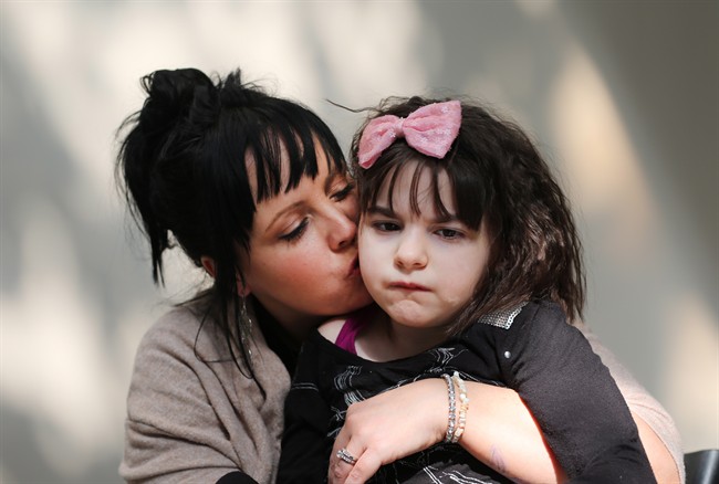 Sandra Wilkinson and her 9-year old daughter Mia at Canadian Cannabis Clinics in St. Catharines on Monday, September 14, 2015. Mrs. Wilkinson brought Mia to this Ontario clinic because she could not get her prescription for medical marijuana renewed at their home in Alberta. Mia has been taking medical marijuana for two years. She went from having 100 seizures a day to being seizure-free for about a year and a half. 