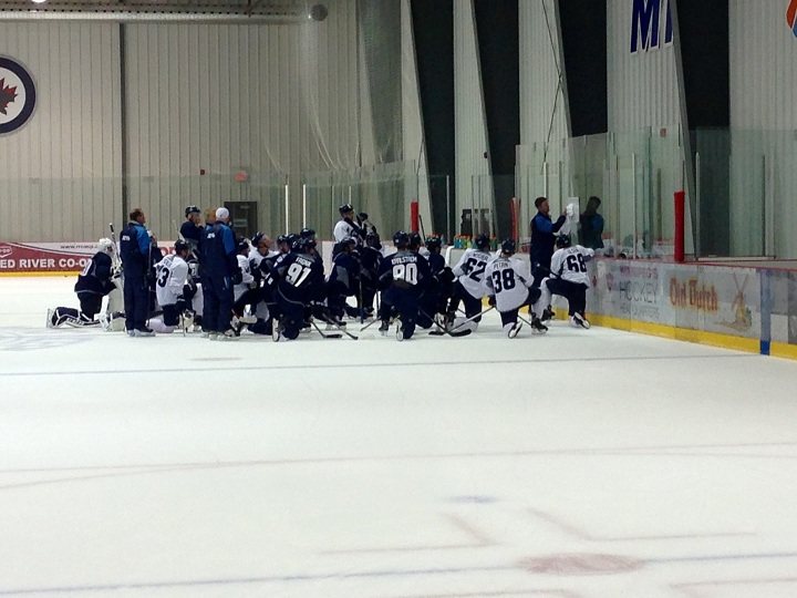 Winnipeg Jets prospects listen to instructions during the opening day of rookie camp.