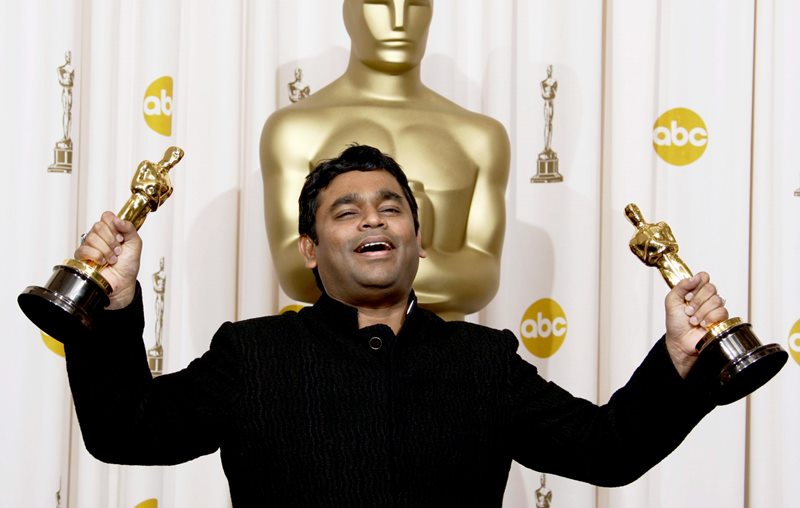 In this Feb. 22, 2009 file photo, A.R. Rahman holds the Oscars for best original score and for best original song "Jai Ho" for his work on "Slumdog Millionaire" during the 81st Academy Awards in the Hollywood section of Los Angeles. 